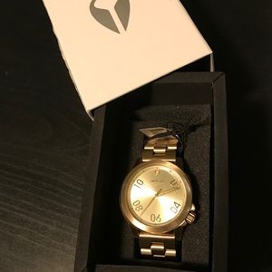 Gold Nixon watch